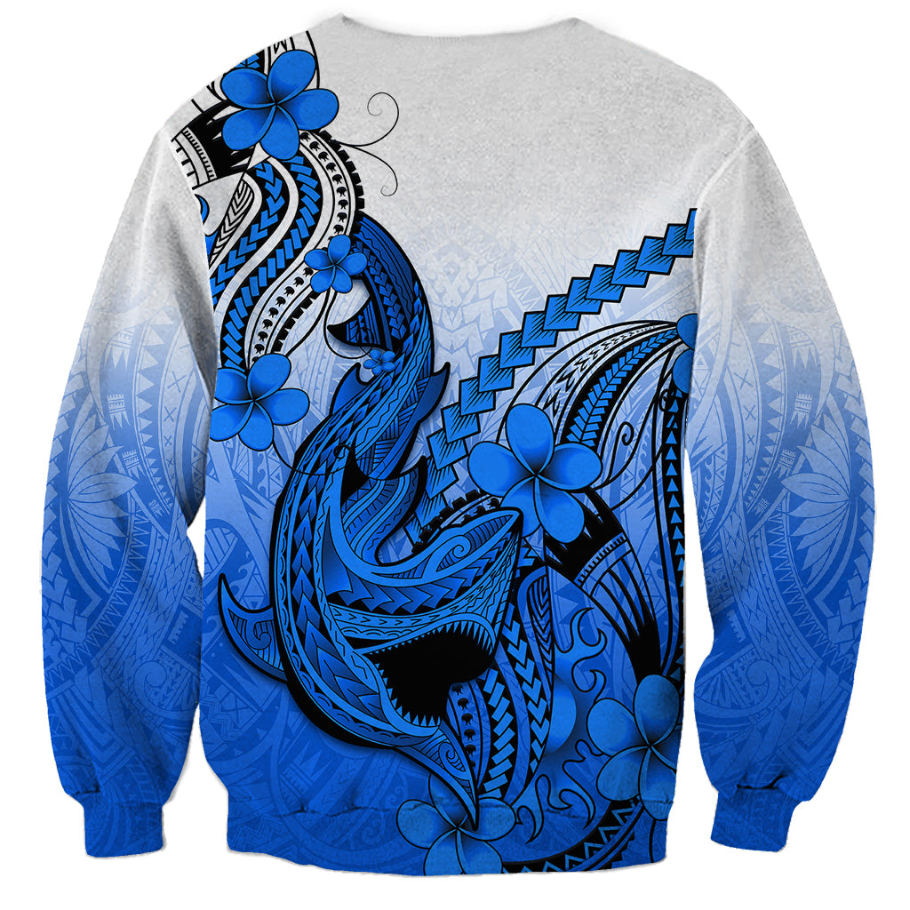 Unisex blue Polynesian shark tattoo sweatshirt with plumeria flowers on back