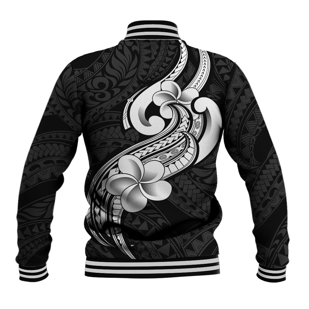 Black baseball jacket back with striped ribbed hem and large white floral tribal artwork