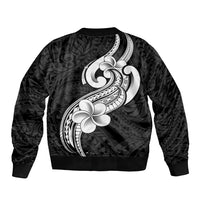 Black bomber jacket back with large white tribal plumeria graphic, ribbed hem