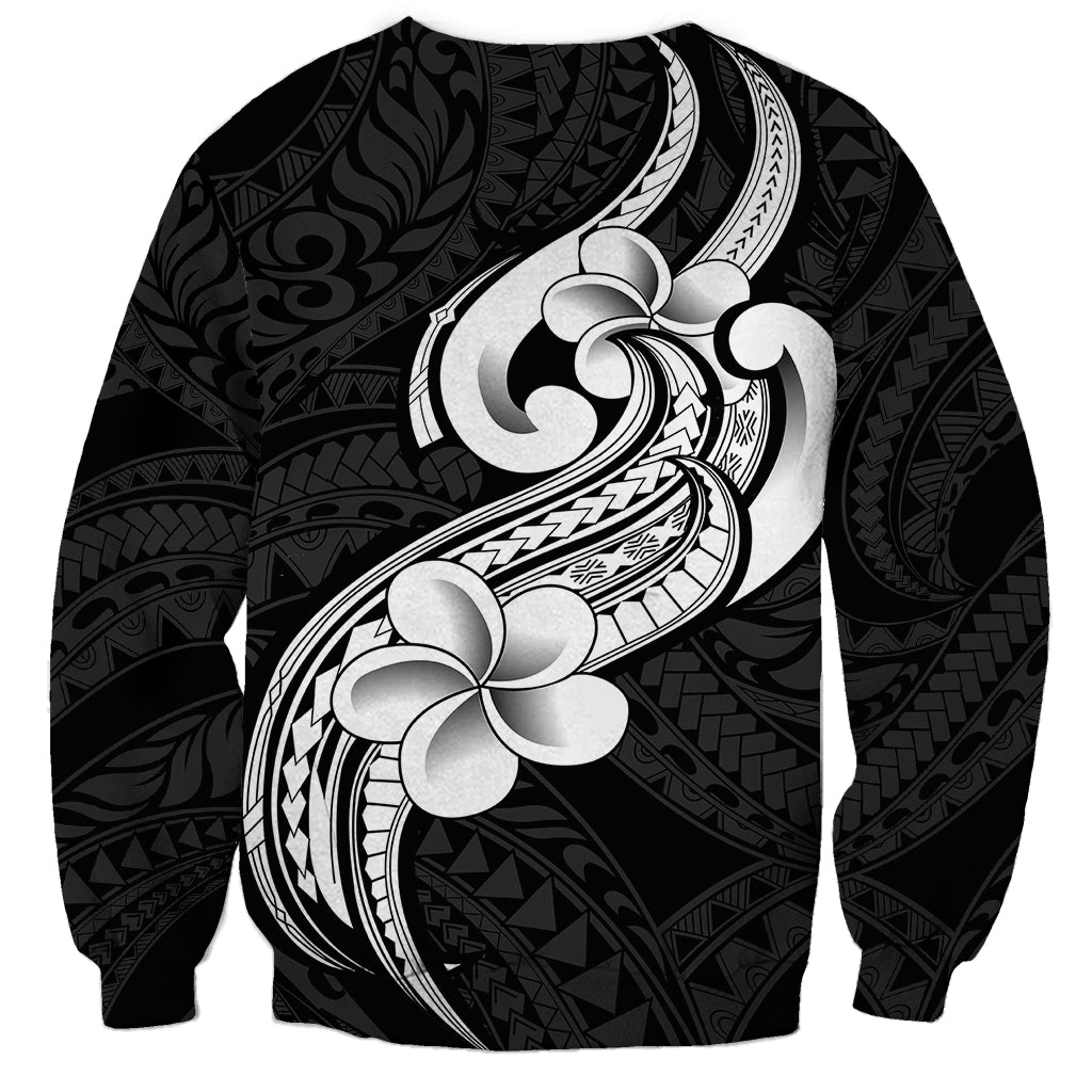 Black crewneck sweatshirt with back-style white plumeria and tribal pattern panel