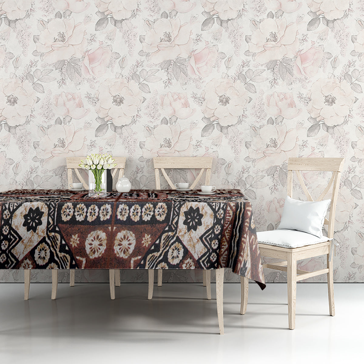 Brown tapa pattern tablecloth with black and cream blocks and rust accent shapes.