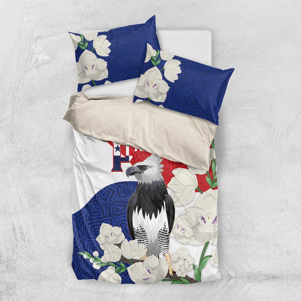 Folded flat-lay bedding set with harpy eagle center art, blue panels, red flag-style band