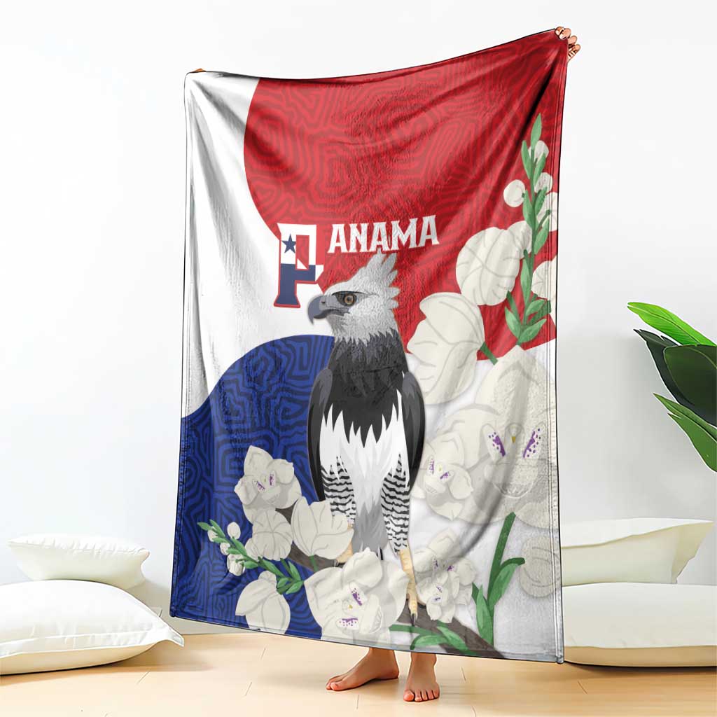 Flag-style throw blanket with harpy eagle, red blue white floral mola pattern, hanging
