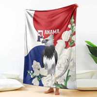 Flag-style throw blanket with harpy eagle, red blue white floral mola pattern, hanging