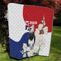 Flag-style quilt in white, red, and blue with harpy eagle, flowers, and leaf motifs