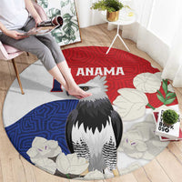 Round rug featuring harpy eagle artwork with red, blue, and white mola-style pattern border