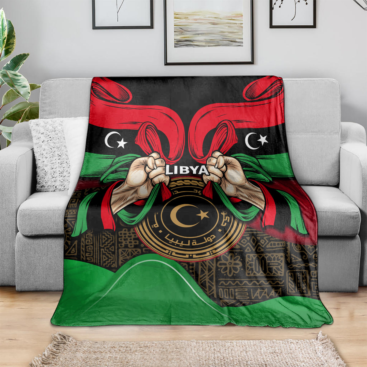 Libya flag-style blanket featuring hands, 'LIBYA' lettering, and circular emblem design
