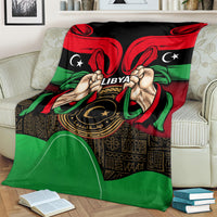 Libya flag-style throw blanket with red, green, and black hands-on-emblem artwork
