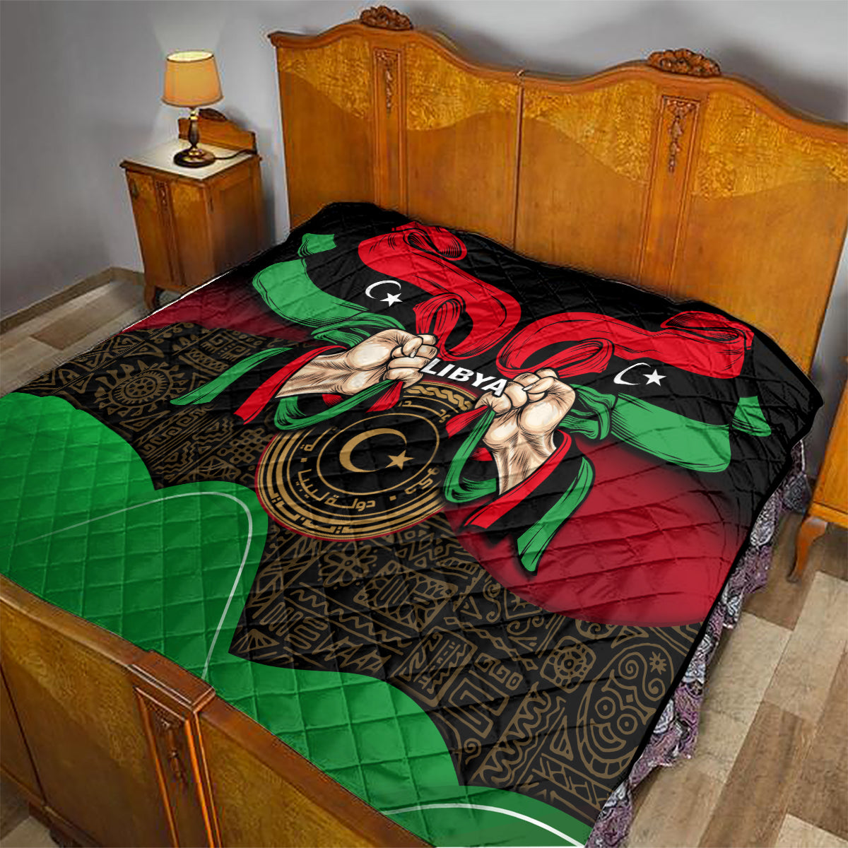 Libya flag-style quilt covering bed with red, black, green colors and hands emblem.
