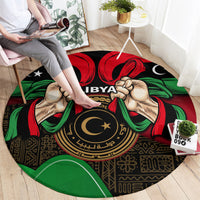 Round black rug with LIBYA emblem and raised hands in red, green, and gold patterns