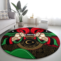 Round black rug with LIBYA emblem, raised hands, and red-green circular banner design