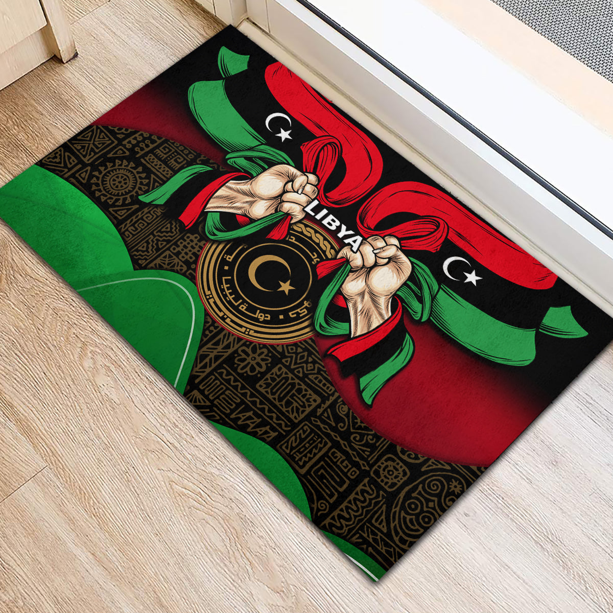 Black rubber doormat with Libya emblem and patterned border, red and green flag ribbons