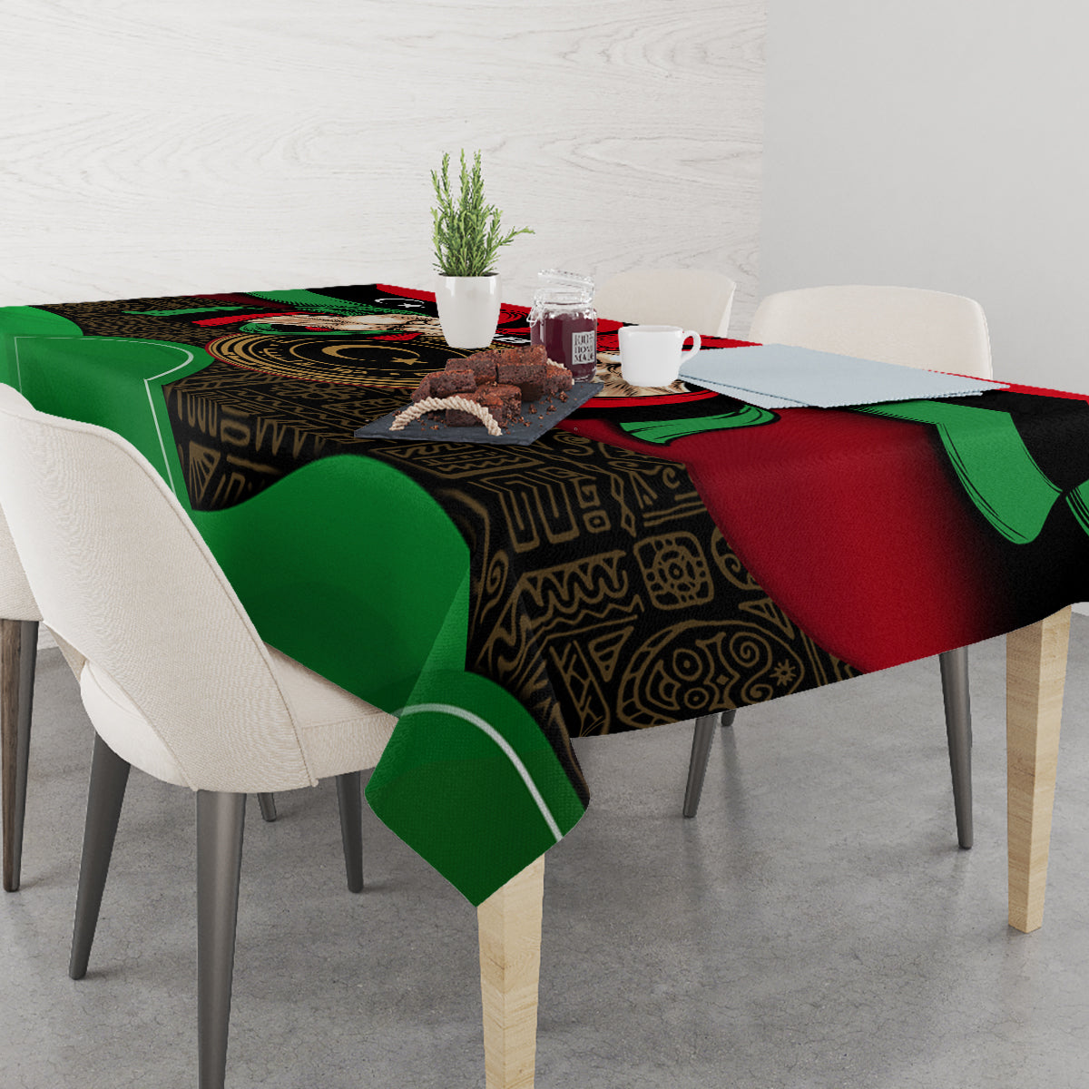 Libya flag patterned tablecloth with green and red panels, black decorative center, on table