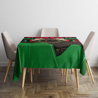 Libya flag patterned tablecloth in green, red, and black with geometric emblem across top