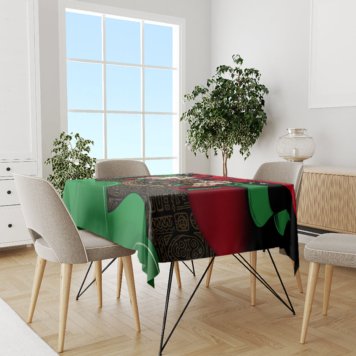Libya flag patterned tablecloth with green base, red and black details, on wooden dining table