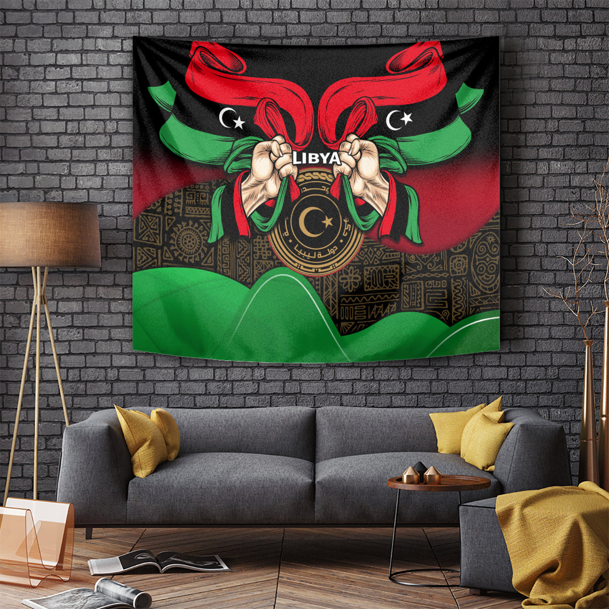 Wall tapestry with black base, red-and-green ribbons, central Libya emblem held by hands.