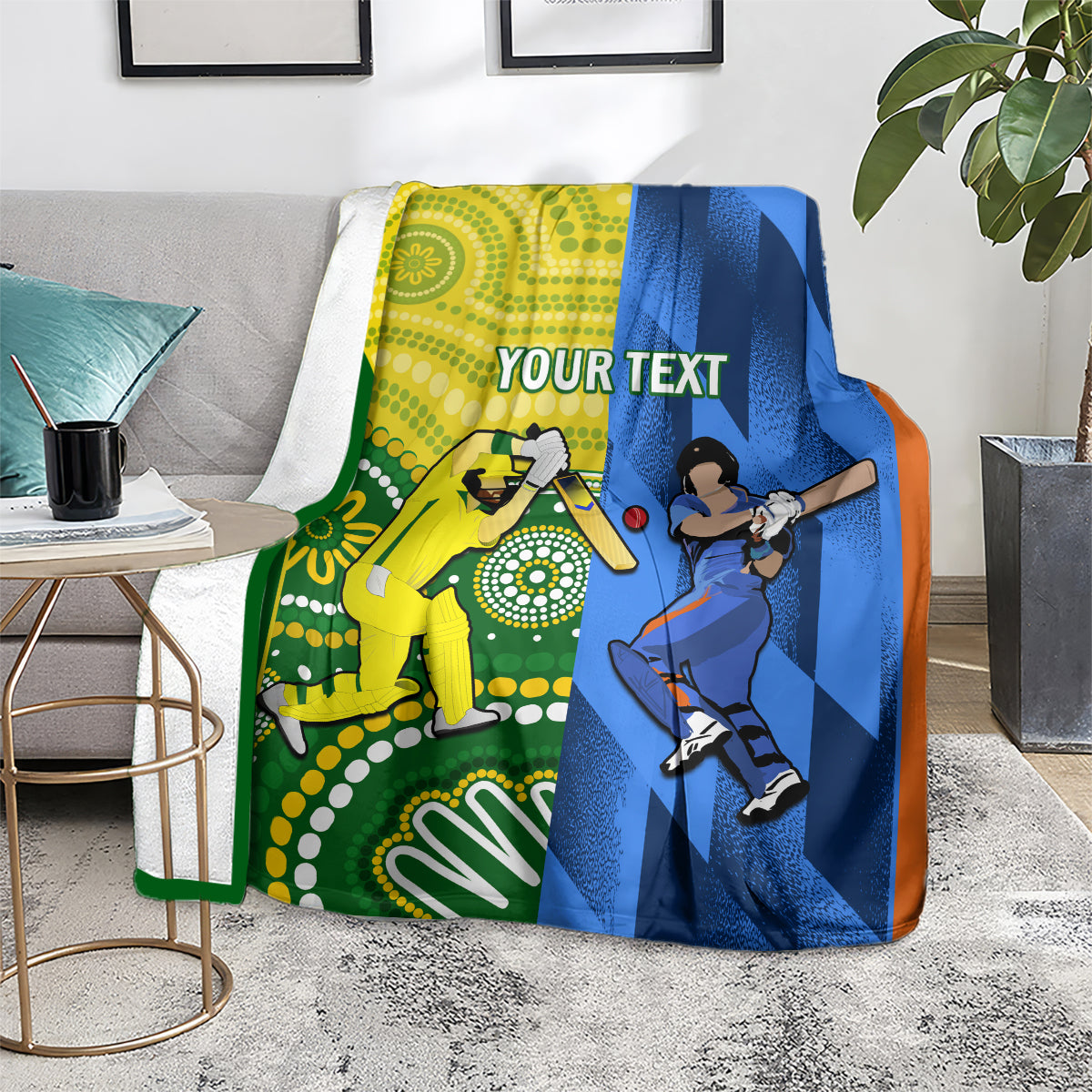 Custom cricket blanket on a floor seat, yellow and blue panels with orange trim and player silhouettes
