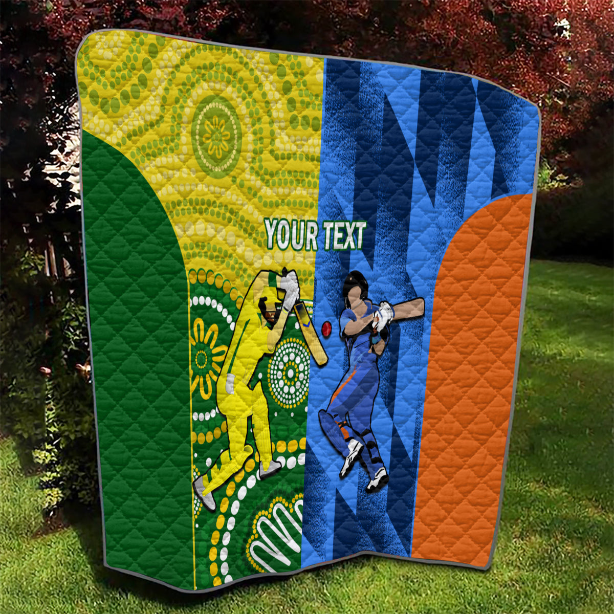 Cricket quilt with quilted stitching in green, yellow, blue, and orange with player graphics