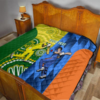 Cricket quilt blanket on bed with green, yellow, blue, and orange panels and batting figures