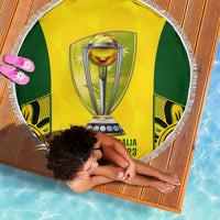 Round blanket yellow with green side panels, trophy in center, white fringe edge