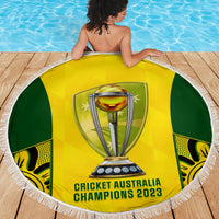 Round beach blanket with trophy and Champions 2023 text, white fringe