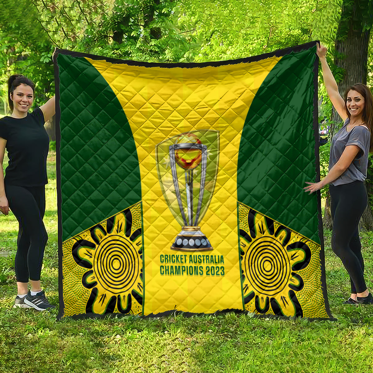 Australia cricket quilt spread out outdoors, green-and-yellow chevron with trophy and emblems