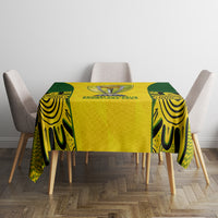 Yellow and green cricket celebration tablecloth with centered trophy print and patterned corners