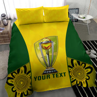 Yellow and green cricket bedding set featuring trophy graphic, "YOUR TEXT" and patterned panels