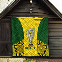 Green and yellow cricket quilt blanket with trophy graphic and flower corner designs