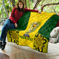 Green and yellow cricket quilt blanket with trophy center and flower corner accents