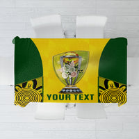 Yellow and green cricket tablecloth with trophy graphic and flame-pattern corners