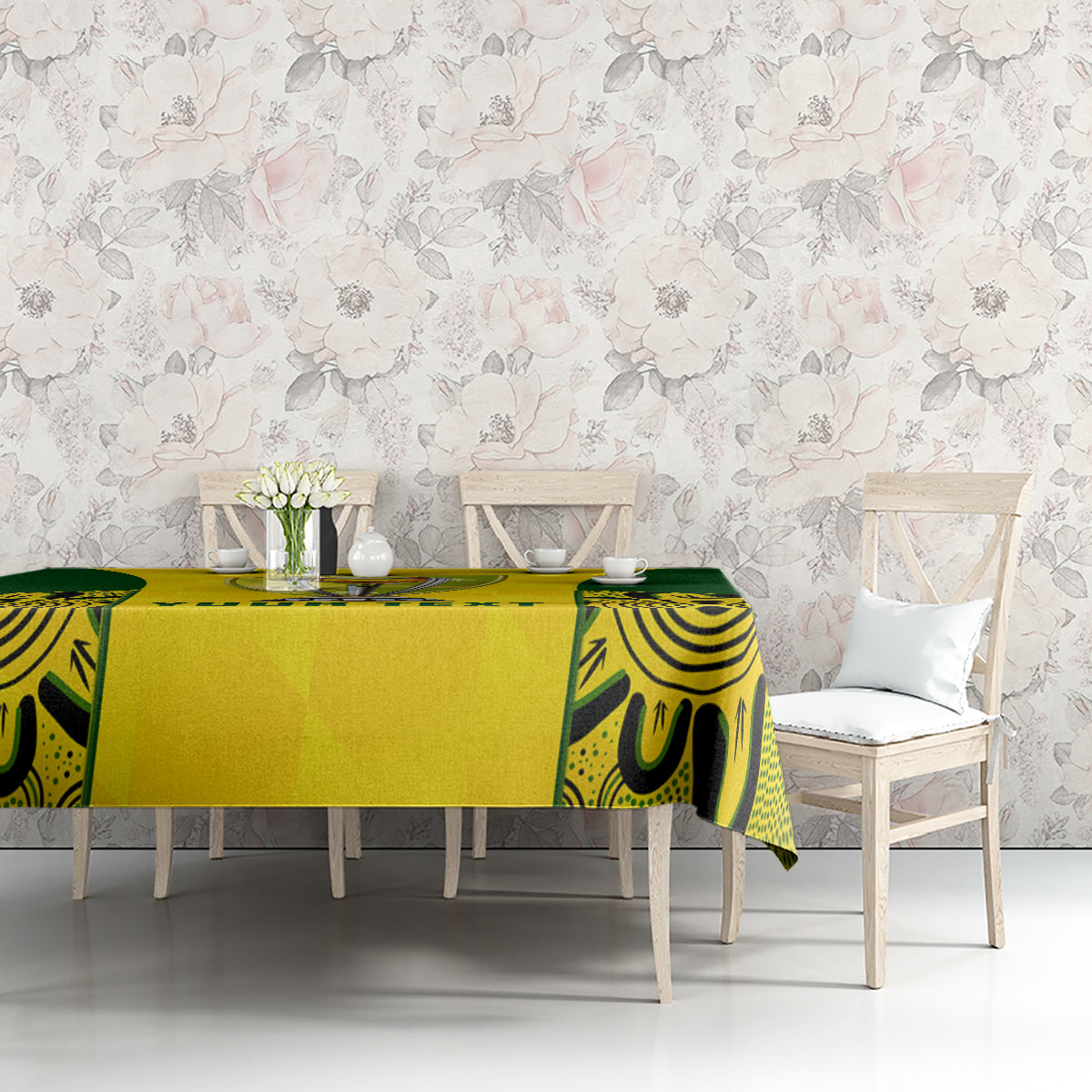 Yellow and green tablecloth with trophy and "YOUR TEXT" print on dining table