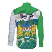 Back of green long-sleeve button shirt with crest, palms, and Unity Freedom Justice text