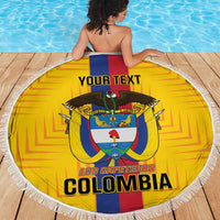 Yellow Colombia football beach blanket with fringe, crest and custom text by pool deck