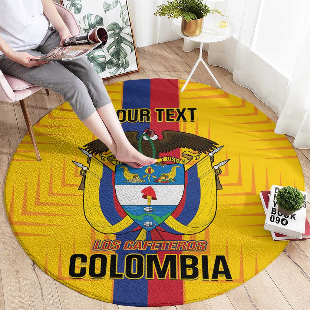 Yellow round football carpet, overhead view, with crest and “LOS CAFETEROS COLOMBIA” text