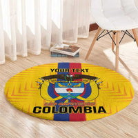 Yellow round football carpet with crest and “LOS CAFETEROS COLOMBIA” text, angled view
