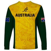 Long-sleeve rugby shirt in yellow with green sleeves, Australia text and kangaroo-star pattern