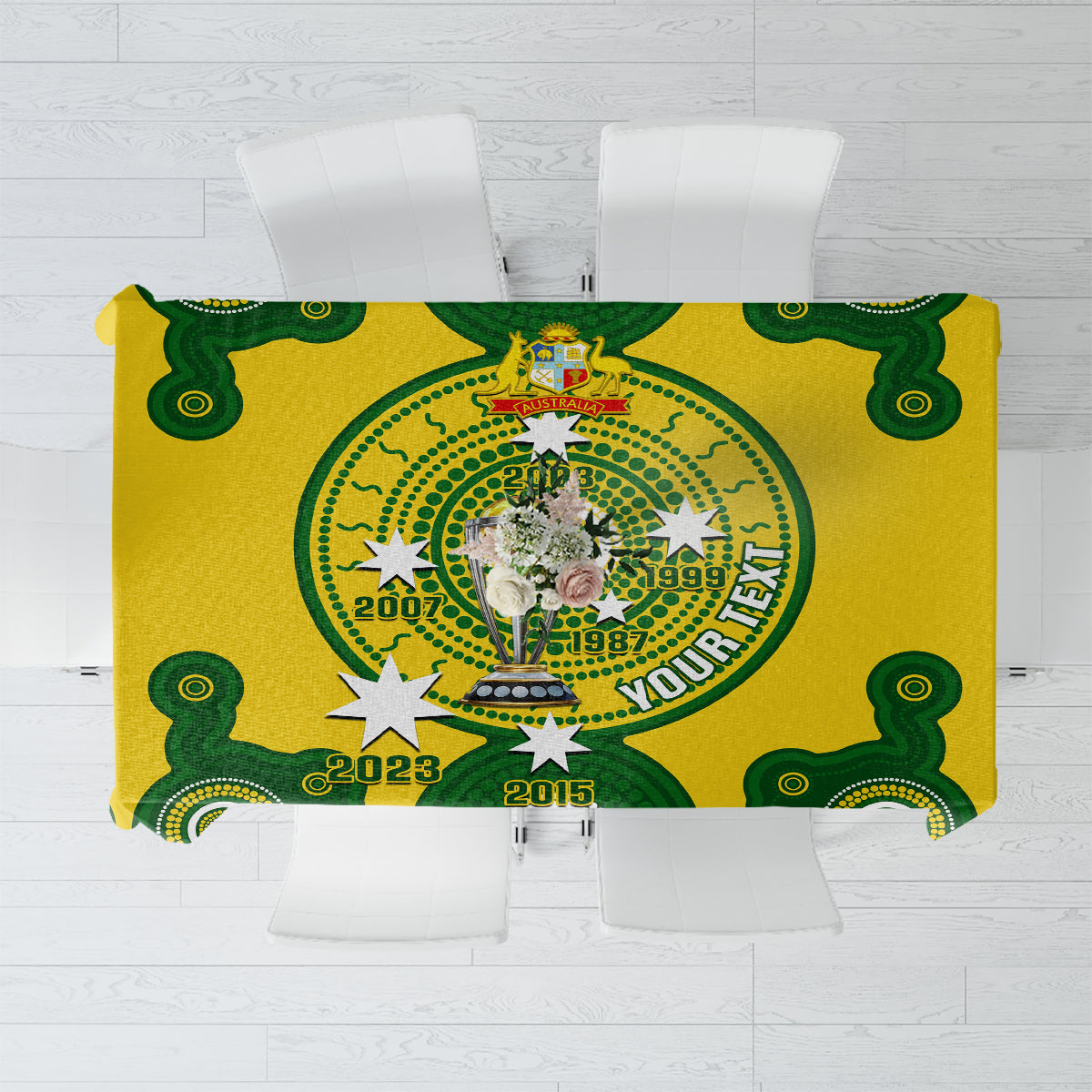 Green and yellow cricket tablecloth with circular emblem and trophy graphic