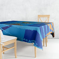 Blue cricket tablecloth draped over table, India Champions design and orange striping