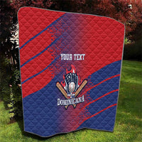 Red and blue quilt blanket with hand-and-ball emblem and 'Dominicana' wordmark