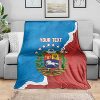 Custom Venezuela baseball blanket with 'Your Text' and crest, spread across couch