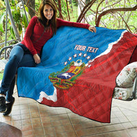 Custom quilt blanket in blue and red with Venezuela emblem, white map outline, and text
