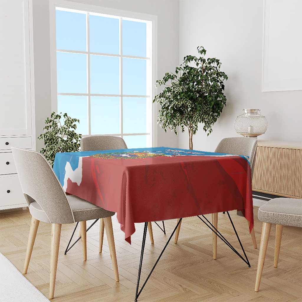 Blue and red Venezuela flag style tablecloth draped over a dining table
