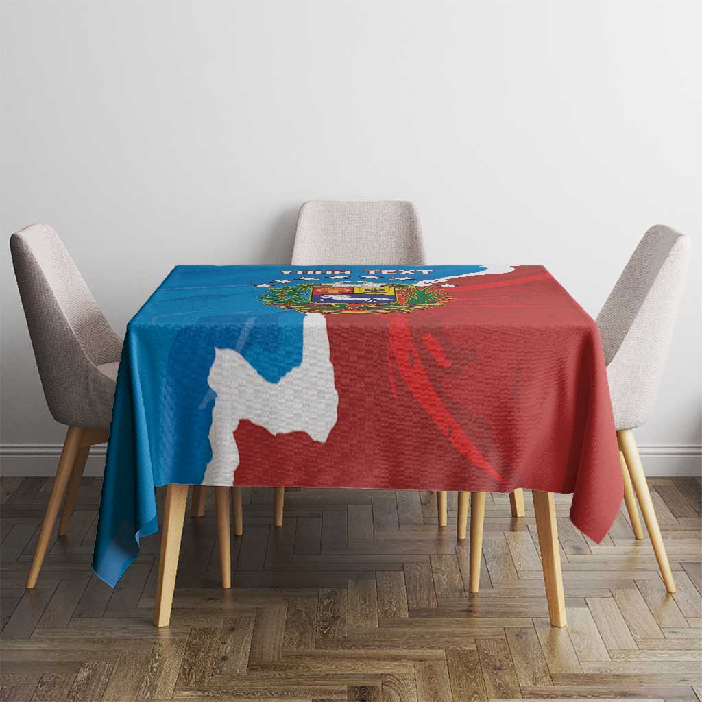 Blue and red Venezuela flag style tablecloth on a table with four chairs