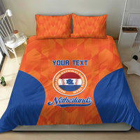 Orange and blue Netherlands bedding set with “YOUR TEXT” text and crest on duvet