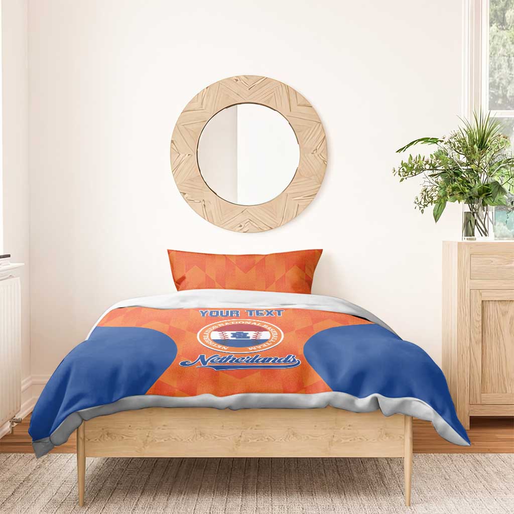 Orange and blue Netherlands bedding set with duvet and pillows featuring “YOUR TEXT” crest
