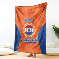 Orange and blue Netherlands custom blanket with “Your Text” front graphic and emblem