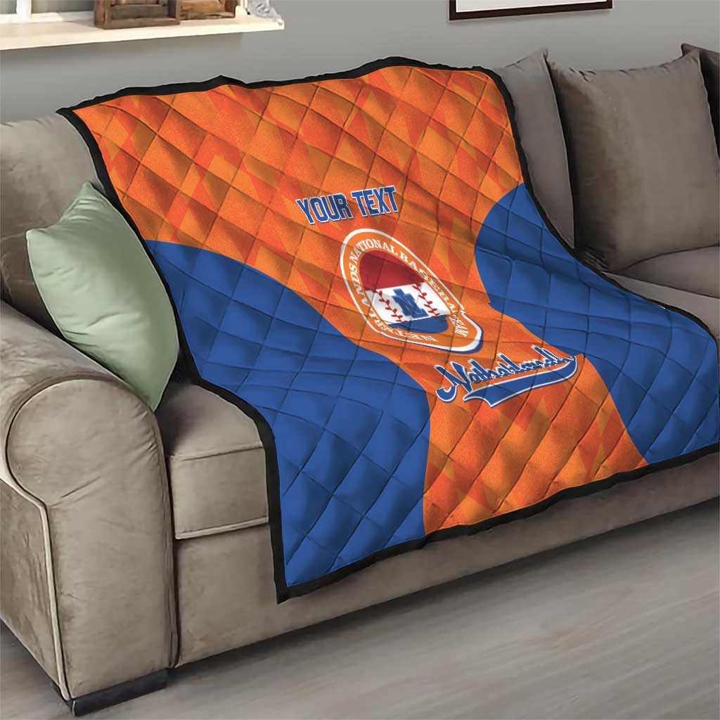 Custom baseball quilt on sofa, orange and blue fan pattern with Netherlands crest and YOUR TEXT
