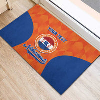Orange and blue custom rubber doormat with your text and Netherlands logo near doorway