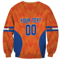 Orange sweatshirt back with YOUR TEXT and blue 00 print, plus striped sleeve bands